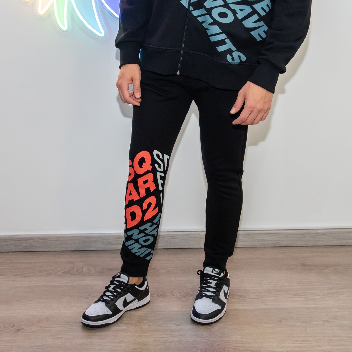 Tuta Dsquared2 nera e arancione